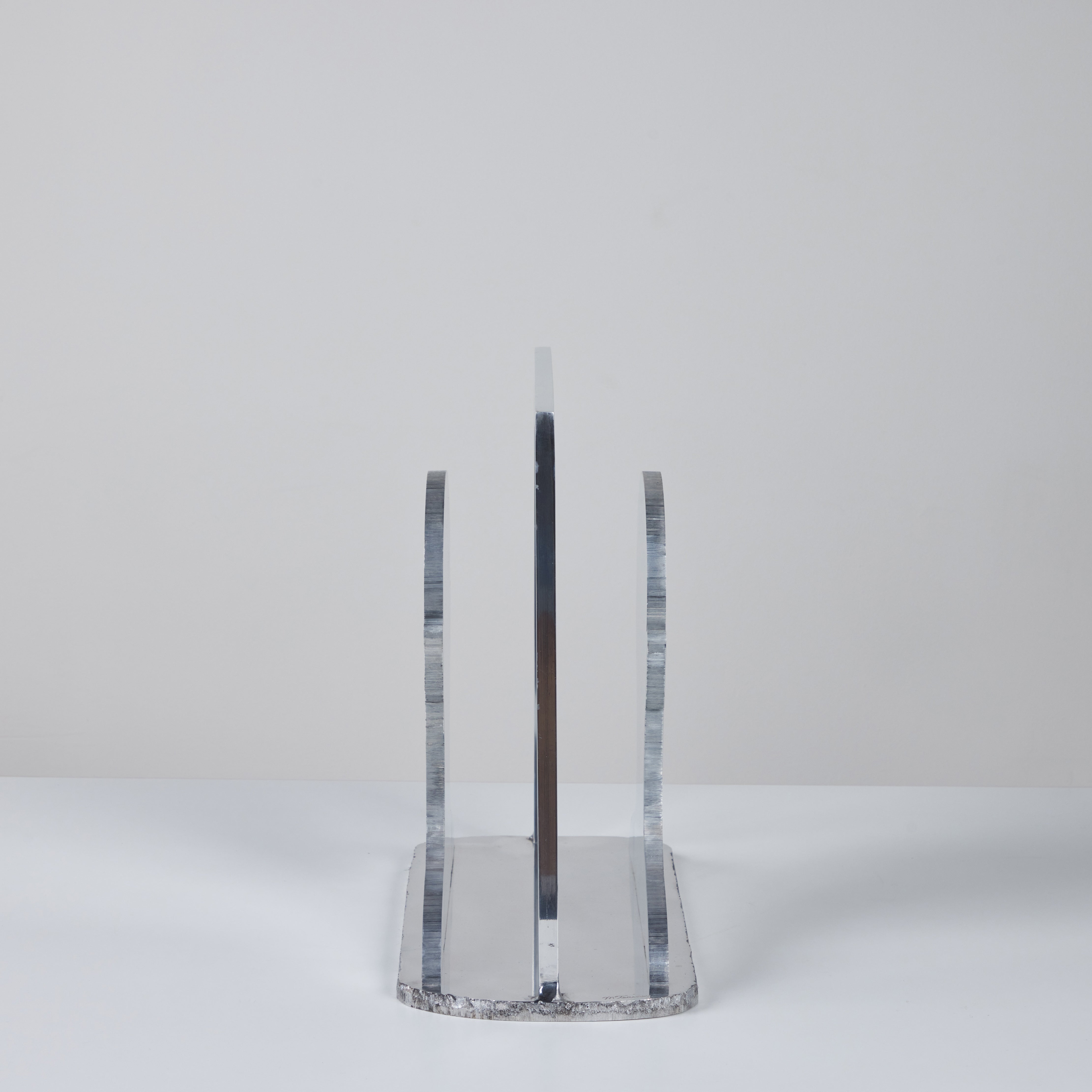 Aluminum Silhouette Magazine Rack – DEN