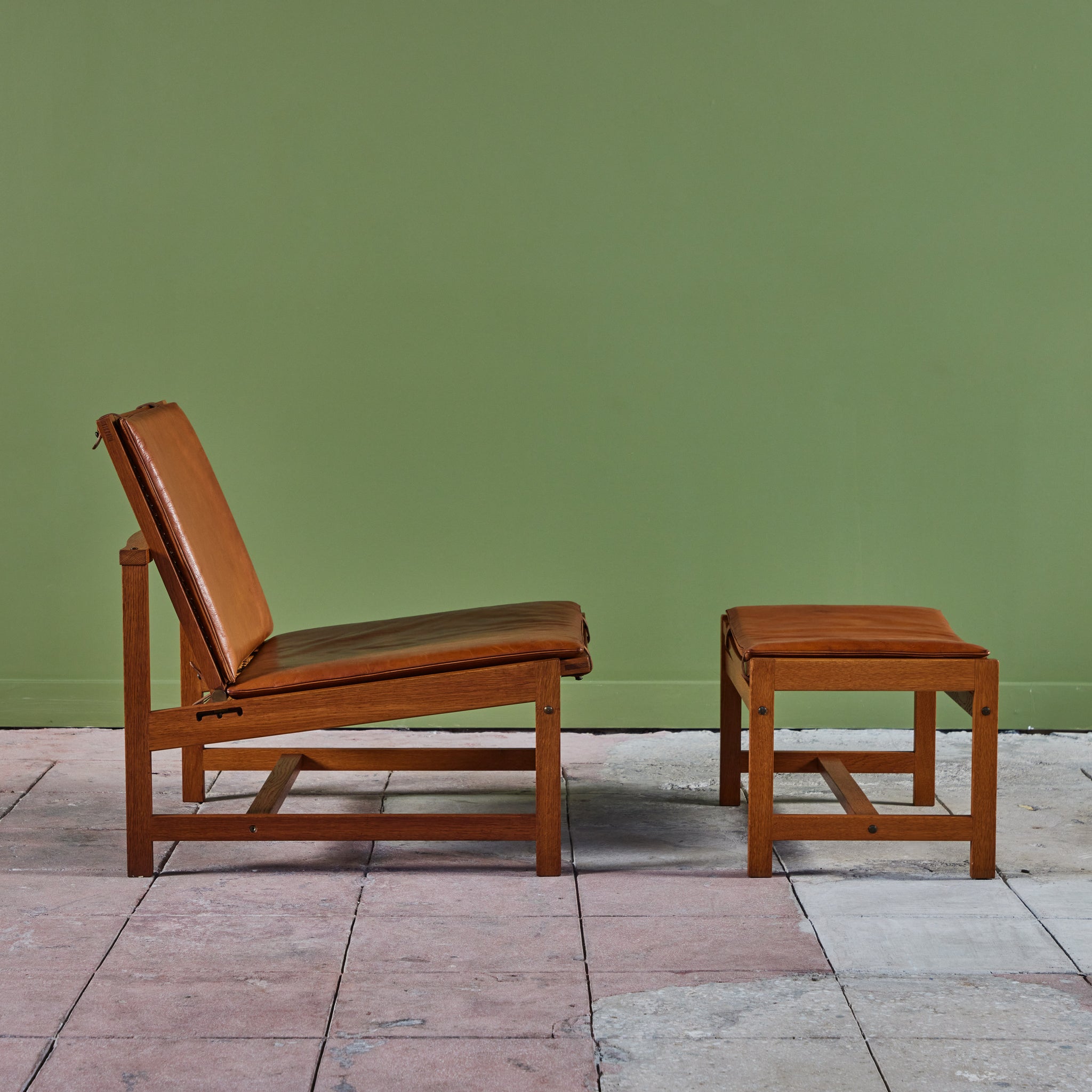 Arne Karlsen and Peter Hjort Leather and Cane Lounge Chair and Ottoman