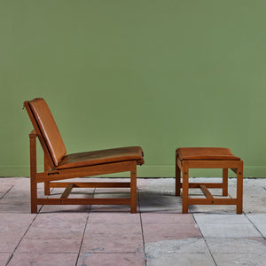 Arne Karlsen and Peter Hjort Leather and Cane Lounge Chair and Ottoman