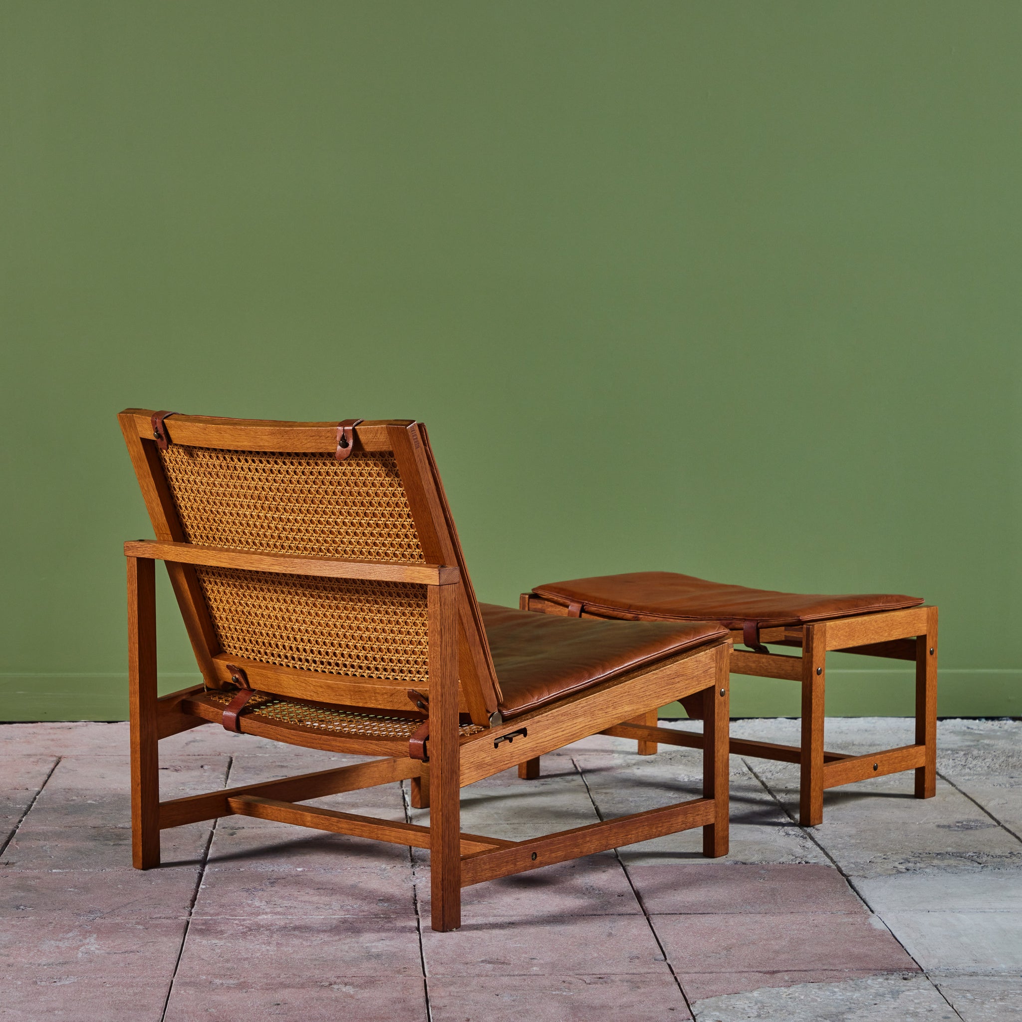 Arne Karlsen and Peter Hjort Leather and Cane Lounge Chair and Ottoman