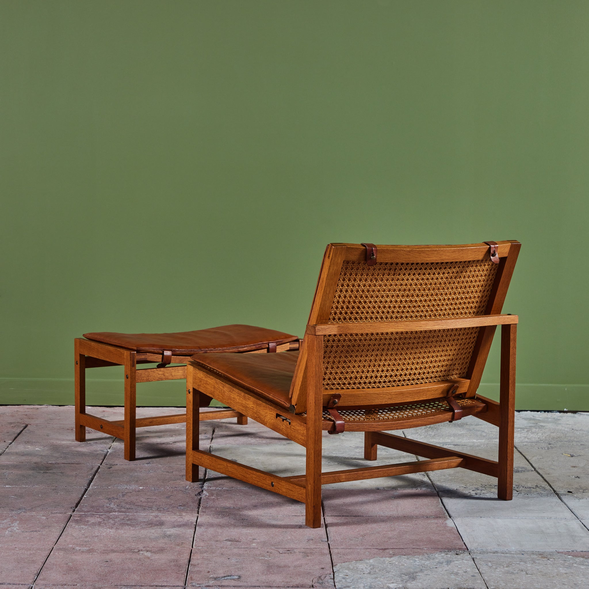 Arne Karlsen and Peter Hjort Leather and Cane Lounge Chair and Ottoman