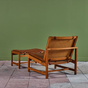Arne Karlsen and Peter Hjort Leather and Cane Lounge Chair and Ottoman
