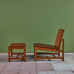 Arne Karlsen and Peter Hjort Leather and Cane Lounge Chair and Ottoman