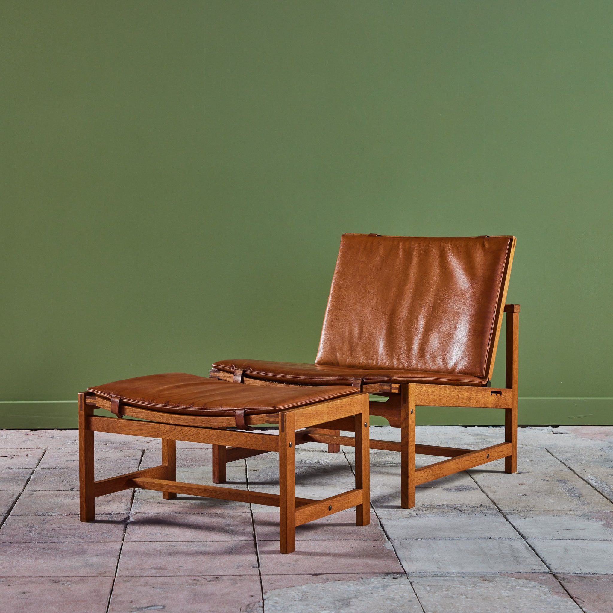Arne Karlsen and Peter Hjort Leather and Cane Lounge Chair and Ottoman