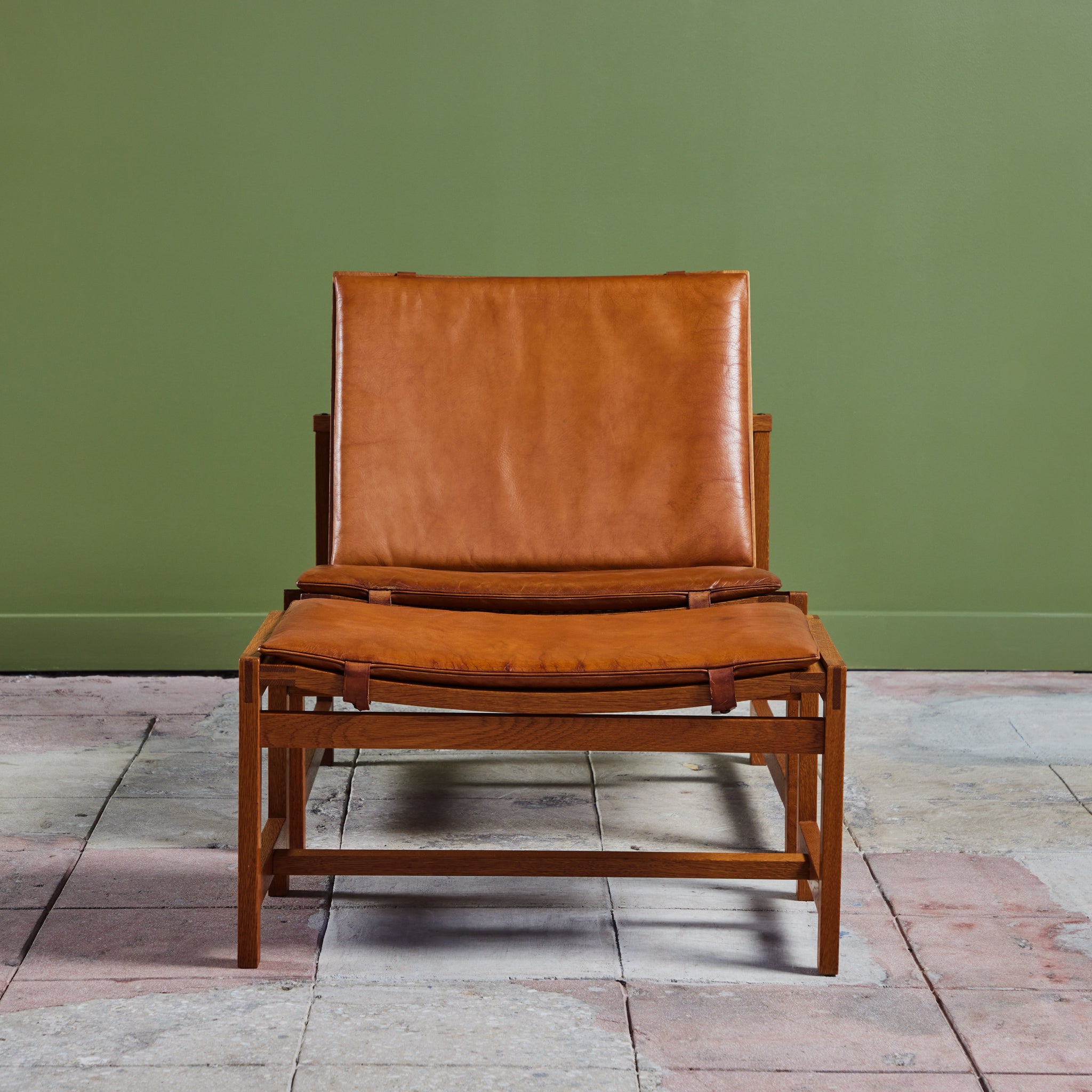 Arne Karlsen and Peter Hjort Leather and Cane Lounge Chair and Ottoman