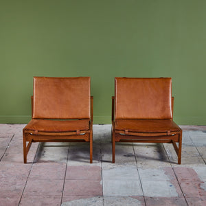 Pair of Arne Karlsen and Peter Hjort Leather and Cane Lounge Chairs