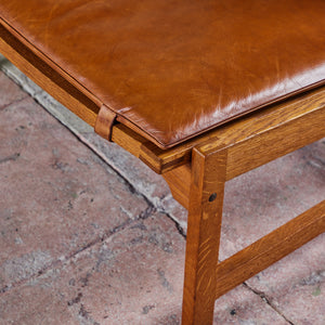Pair of Arne Karlsen and Peter Hjort Leather and Cane Lounge Chairs
