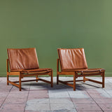 Pair of Arne Karlsen and Peter Hjort Leather and Cane Lounge Chairs