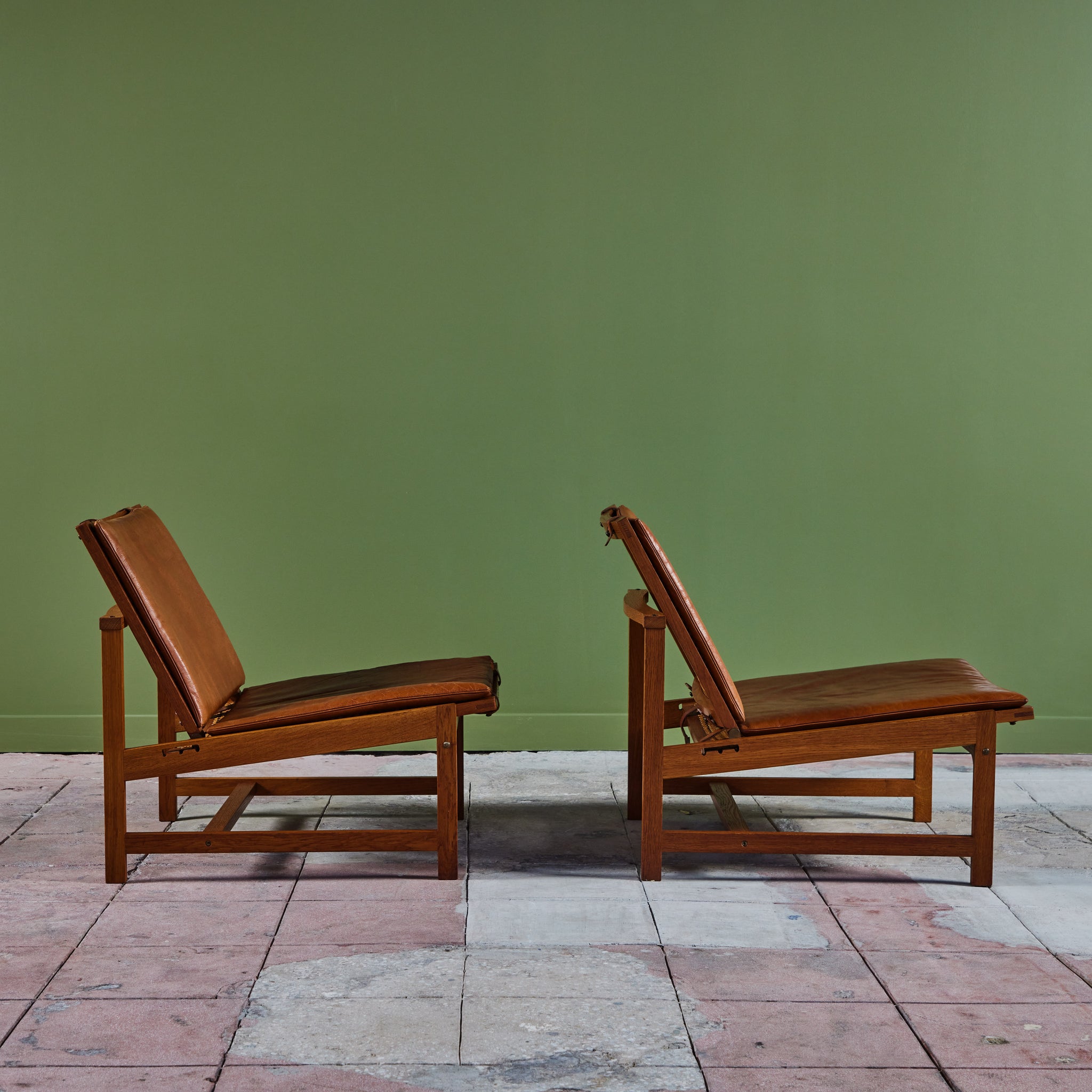 Pair of Arne Karlsen and Peter Hjort Leather and Cane Lounge Chairs