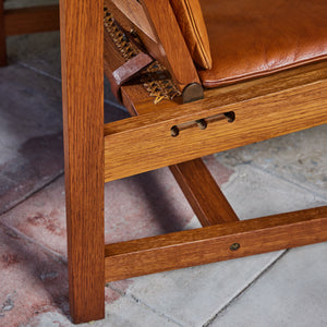 Pair of Arne Karlsen and Peter Hjort Leather and Cane Lounge Chairs