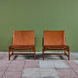 Pair of Arne Karlsen and Peter Hjort Leather and Cane Lounge Chairs
