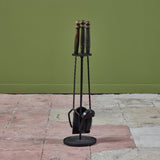 Set of Wrought Iron Fireplace Tools with Carved Wood Handles