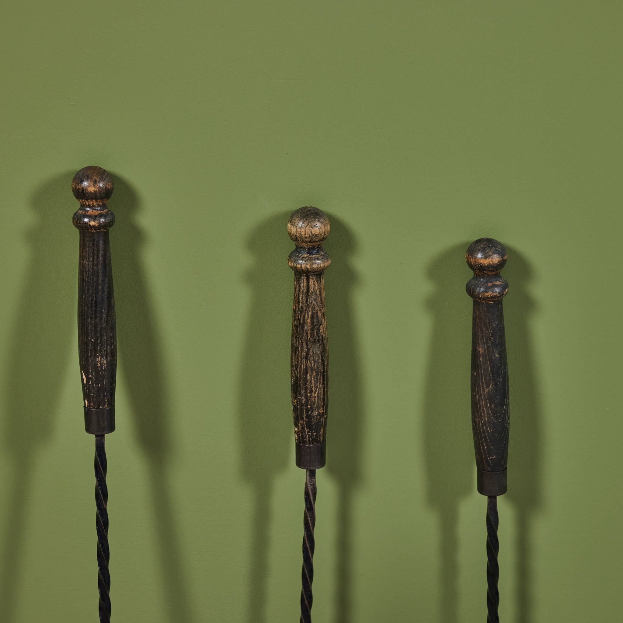 Set of Wrought Iron Fireplace Tools with Carved Wood Handles