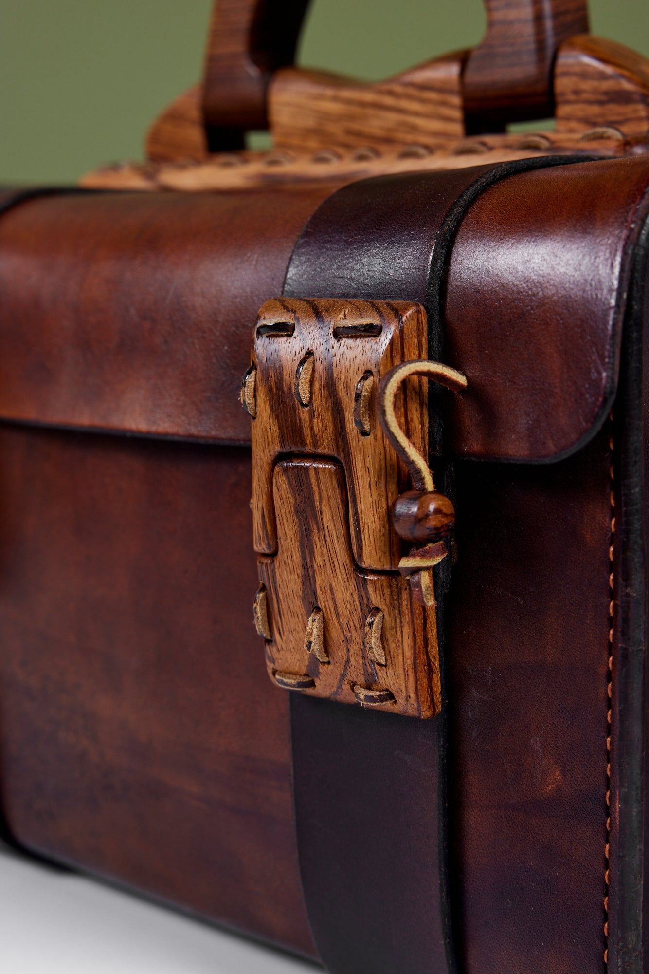 Cuendet Leather Strap Bag with Wood Latches