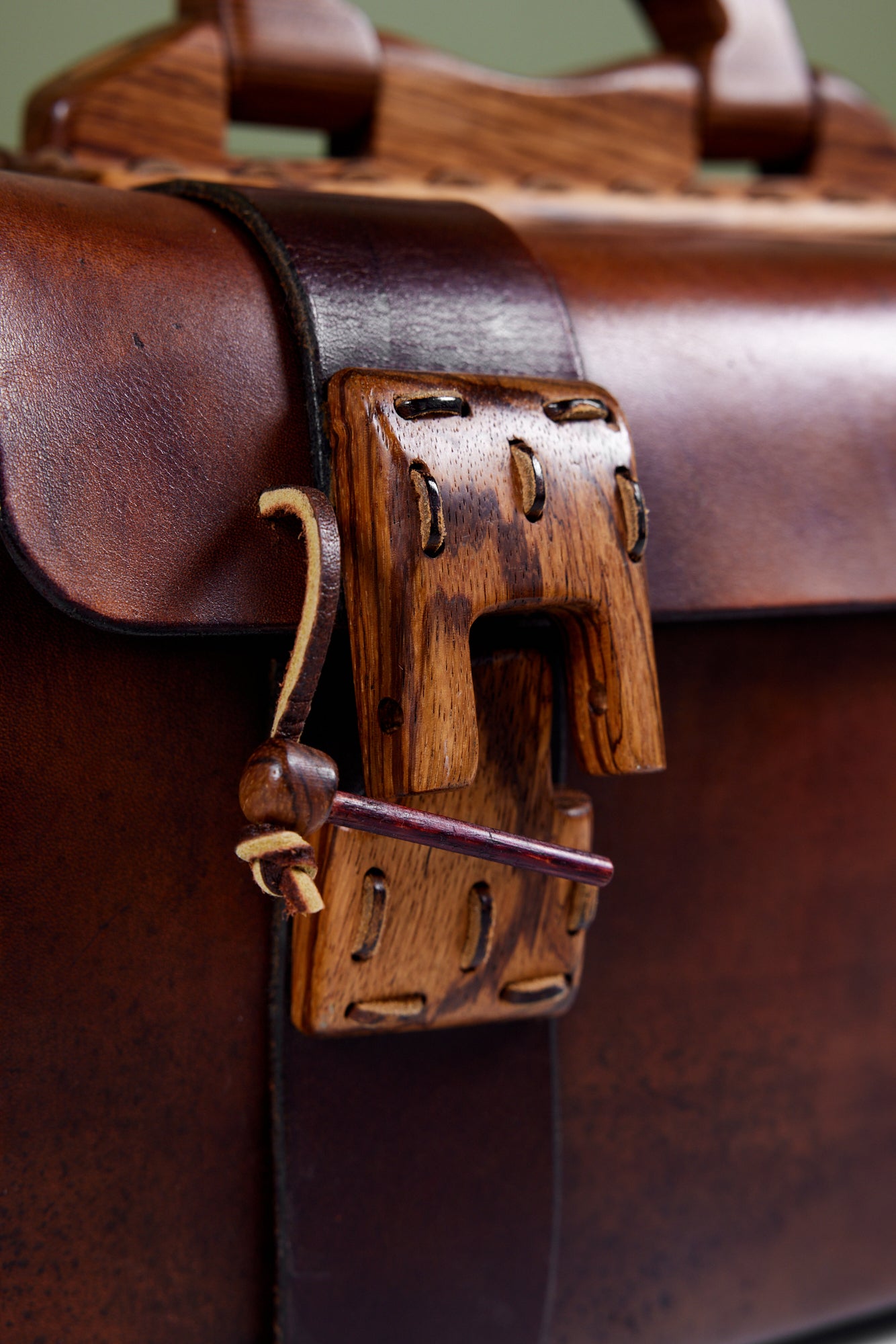 Cuendet Leather Strap Bag with Wood Latches