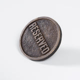 Brass "Reserved" Button