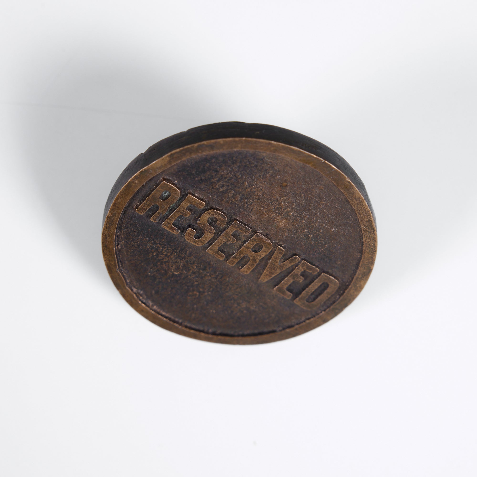 Brass "Reserved" Button