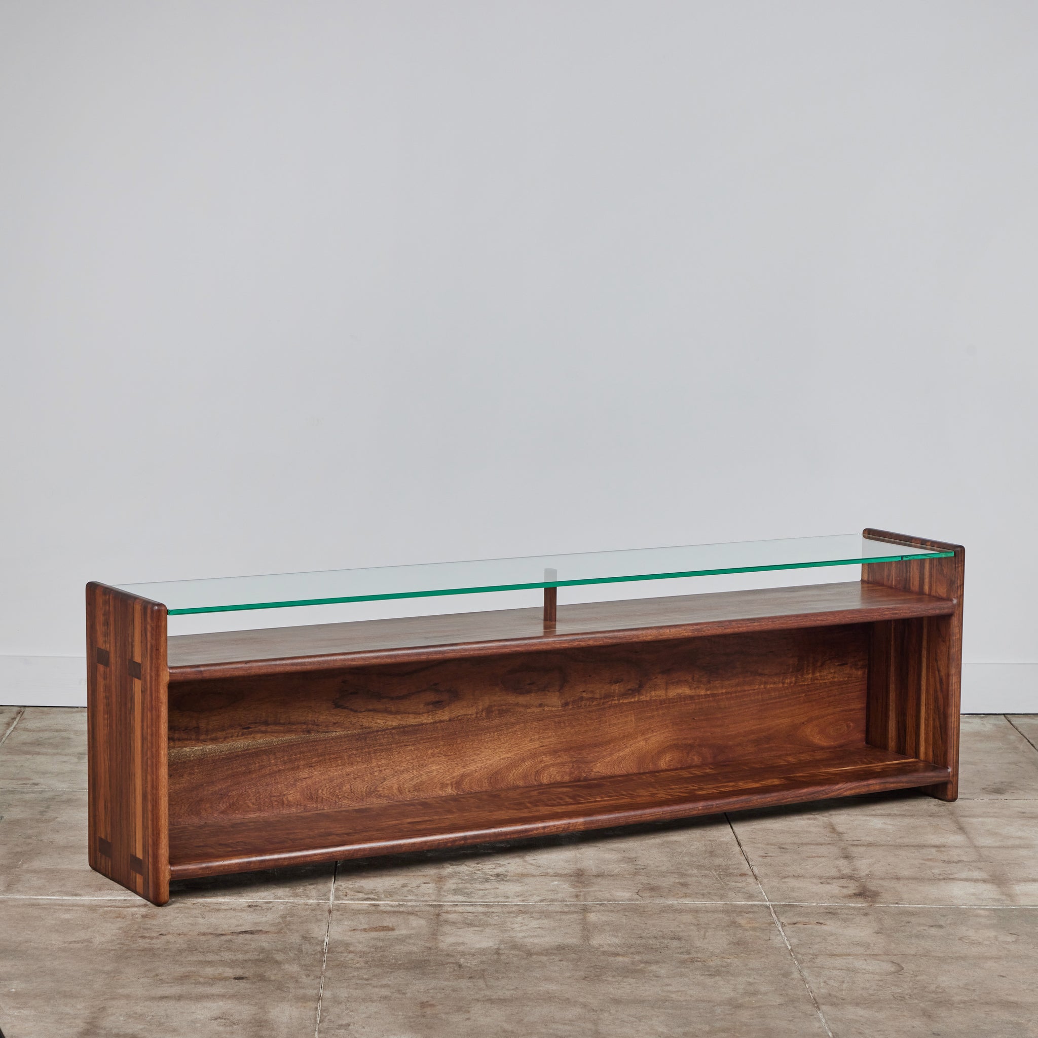 Gerald McCabe Console in Shedua with Glass Top