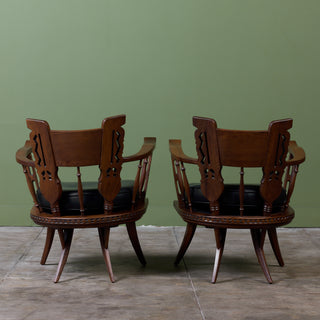 Pair of Carved Walnut Lounge Chairs in the Style of Ettore Zaccari