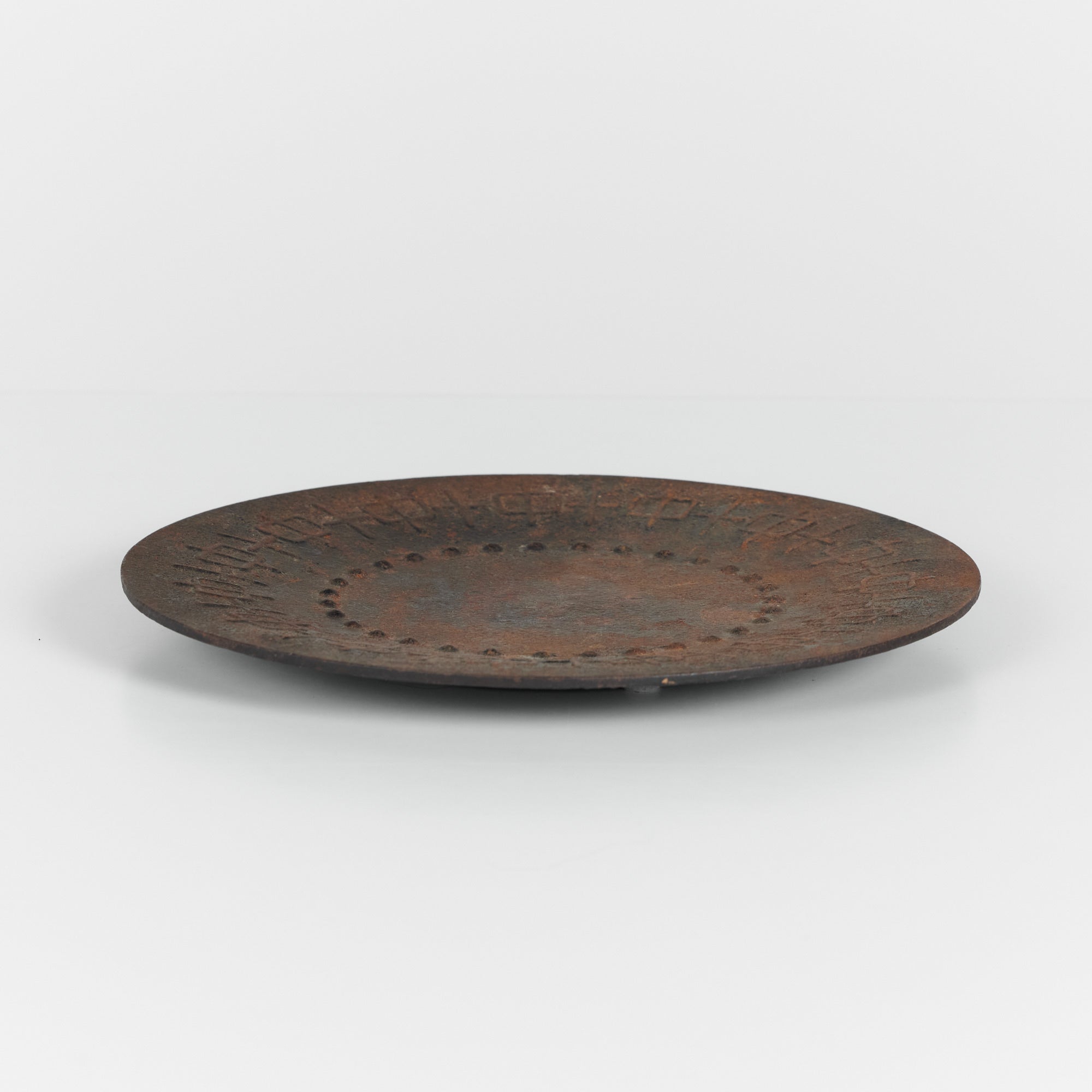 Patinated Metal Dish with Raised Geometric Pattern